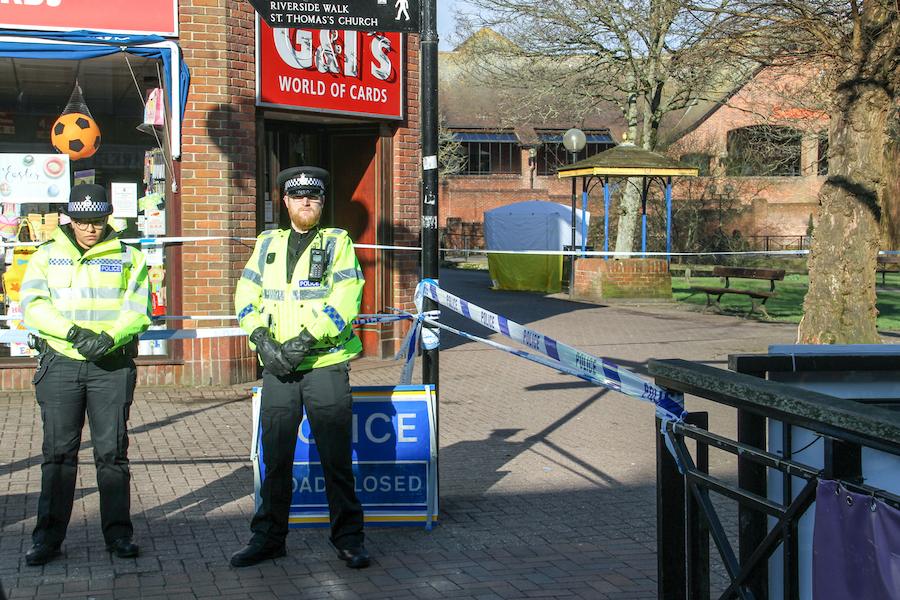 Salisbury, Wiltshire/UK - March 7 2018:  Police guard the bench Sergie and Yulia Skripal were found in The Maltings Shopping Centre during the Novichok incident.